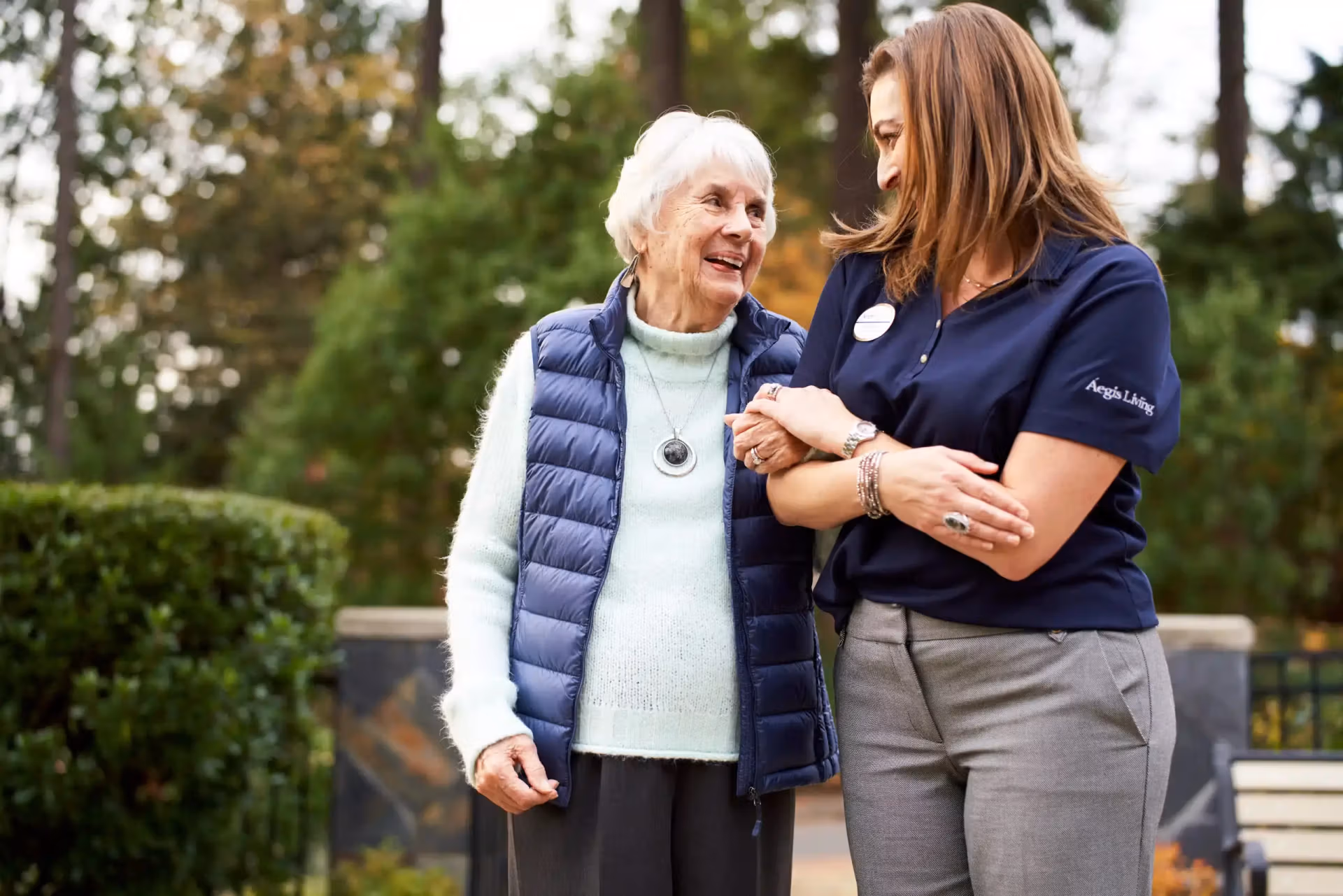 Áegis Living caregiver supporting a resident
