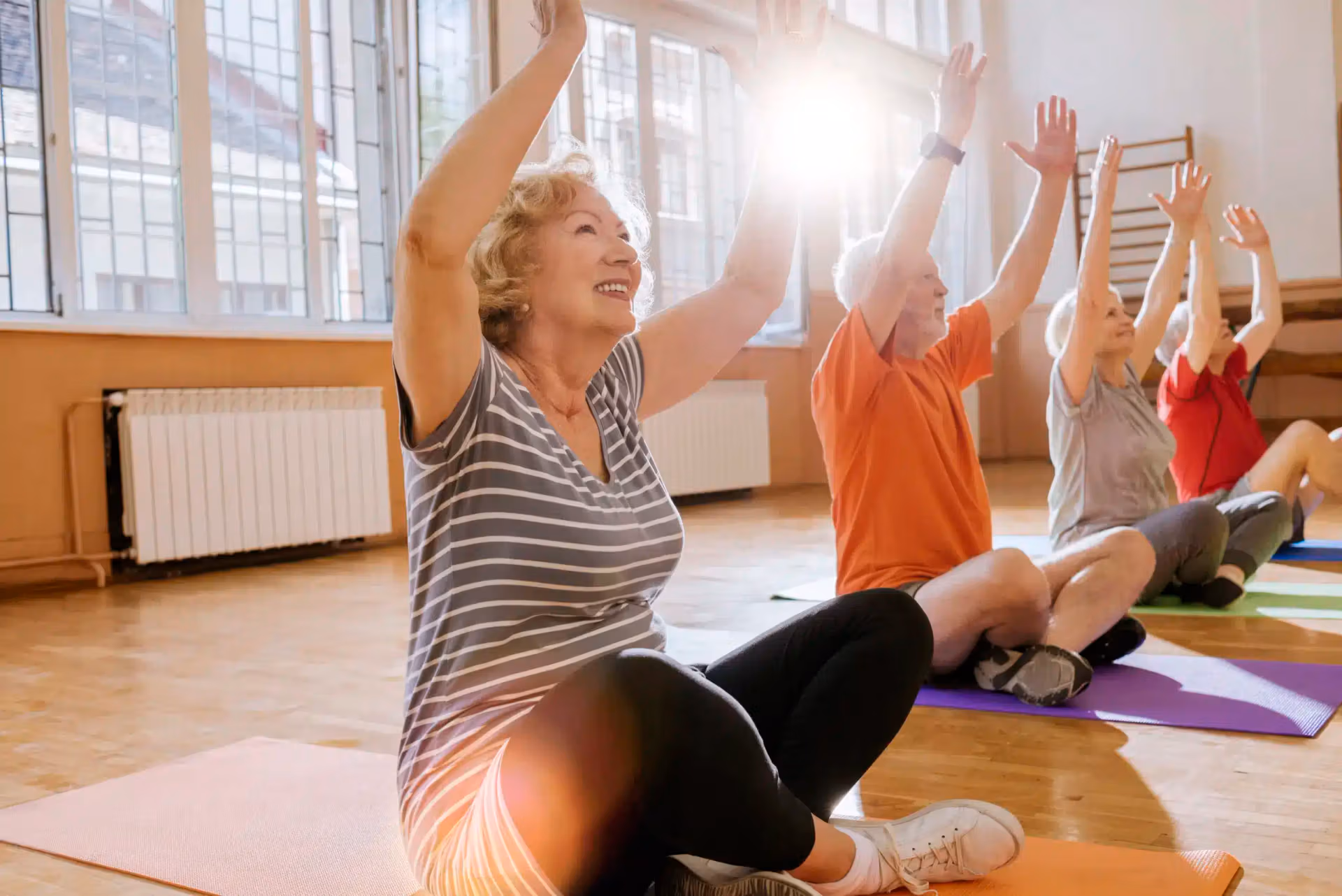 An Áegis Living resident taking part in a gentle wellness session