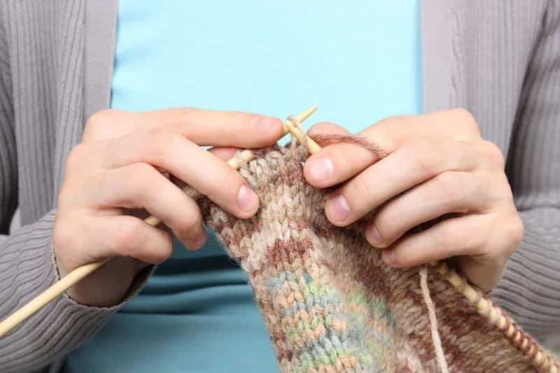 from Aegis of Aptos knit blankets, caps and other items to donate to local charities, hospitals and other organizations