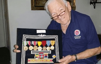 Art Peterson holds display of military medals
